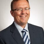 Fitting and Dispensing Hearing Aids: An Interview with Brian Taylor, AuD