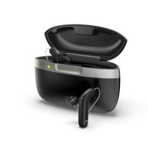 Widex SmartRIC hearing aid shown with charger